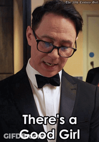 Man In Tuxedo And Bow Tie Saying Good Girl GIF