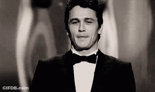 Man In Tuxedo And Bow Tie Smiling GIF