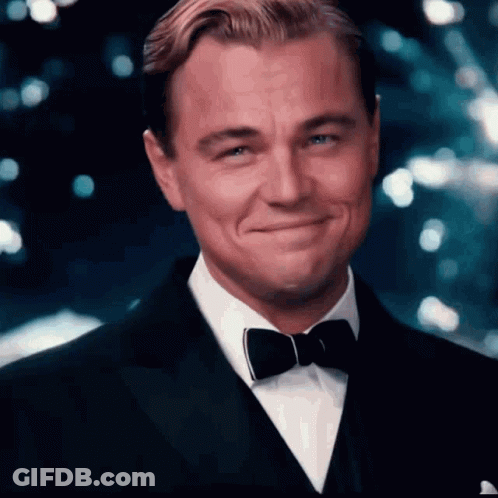 Man In Tuxedo And Bow Tie Smiling GIF