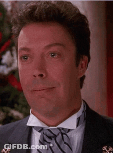 Man In Tuxedo And Bow Tie Smiling GIF