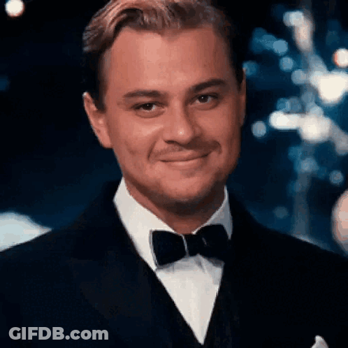 Man In Tuxedo And Bow Tie Smiling GIF
