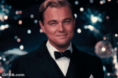 Man In Tuxedo And Bow Tie Smiling GIF