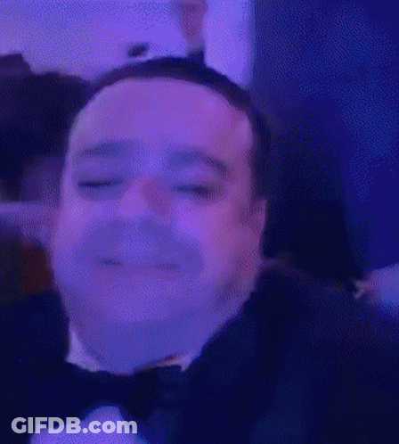 Man In Tuxedo And Bow Tie Smiling GIF