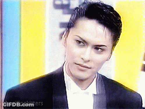 Man In Tuxedo And Bow Tie With Chegifingkitters GIF