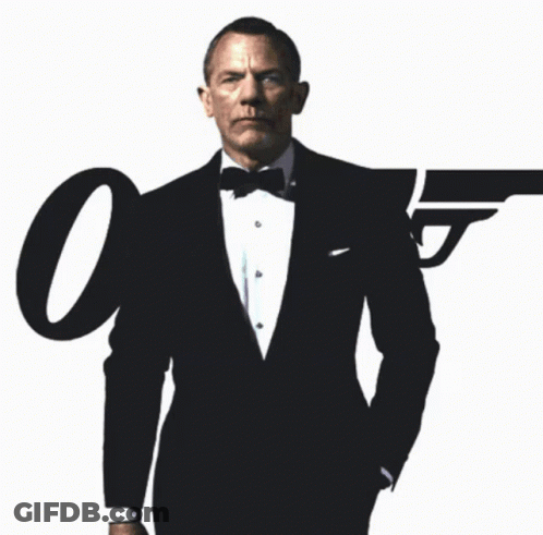 Man In Tuxedo And Bow Tie With Large O GIF