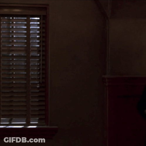 Man In Tuxedo And Woman In Black Dress GIF