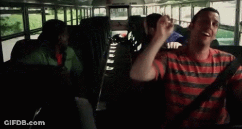 Man In Tuxedo And Woman In Red Dancing GIF