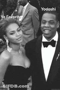 Man In Tuxedo And Woman In Strapless Dress Posing GIF