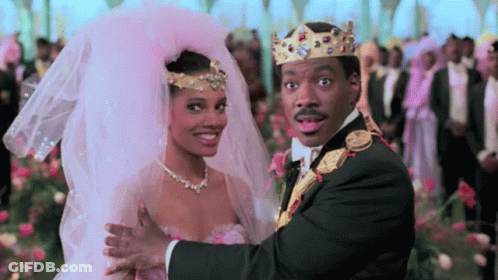 Man In Tuxedo And Woman In Wedding Dress Dancing GIF