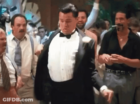 Man In Tuxedo Dancing In Crowd GIF