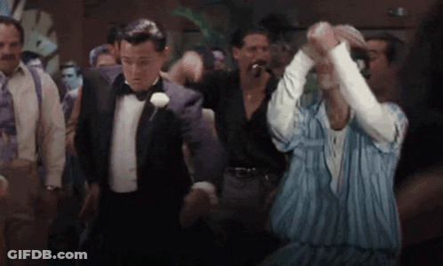 Man In Tuxedo Dancing With Man In Striped Shirt GIF