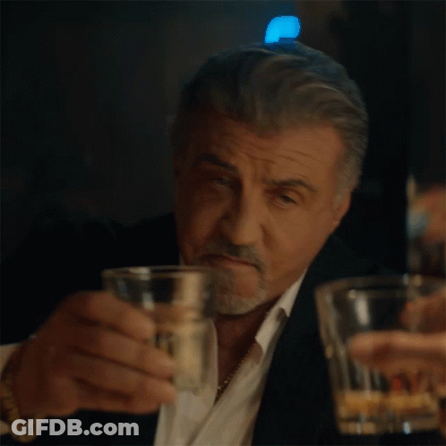 Man In Tuxedo Drinking Glass GIF