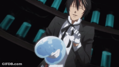 Man In Tuxedo Holding Blue Ball GIF