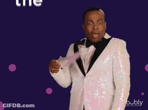 Man In Tuxedo Holding Fan Saying The Shade GIF