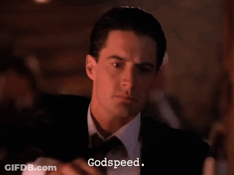 Man In Tuxedo Holding Gun GIF