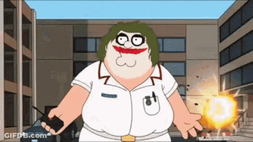 Man In Tuxedo Holding Soccer Ball On Stage GIF