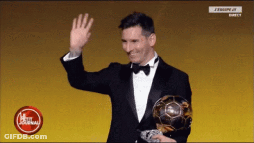 Man In Tuxedo Holding Soccer Ball With Petit Journal Logo GIF