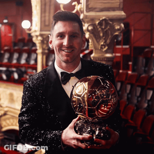 Man In Tuxedo Holding Trophy Saying Lionel Messi GIF