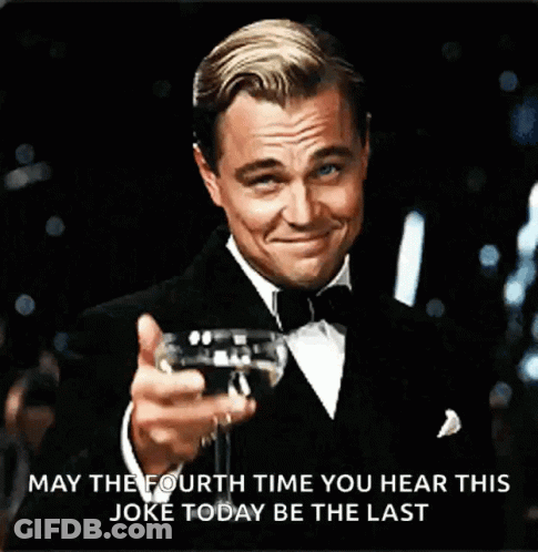 Man In Tuxedo Holding Wine GIF