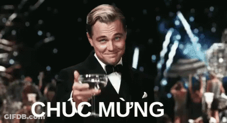 Man In Tuxedo Holding Wine Making Funny Face GIF