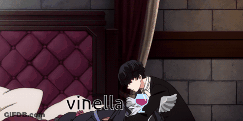 Man In Tuxedo Holding Wine With Vinella GIF