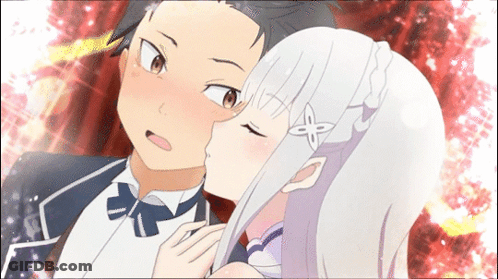 Man In Tuxedo Kissing Girl With White Hair GIF