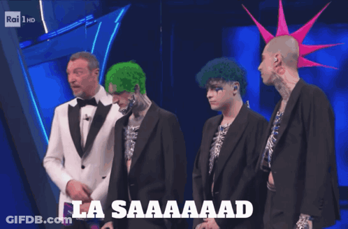 Man In Tuxedo Laughing La Saaaaad GIF