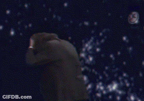 Man In Tuxedo Looking At Camera GIF