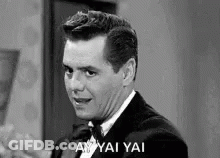 Man In Tuxedo Making Funny Face GIF