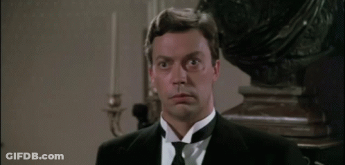 Man In Tuxedo Making Surprised Face GIF