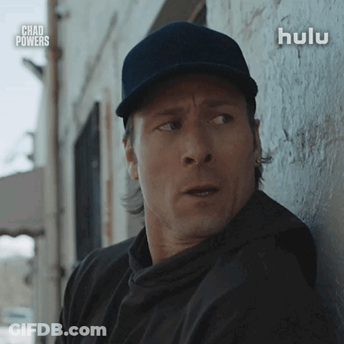 Man In Tuxedo Next To Man In Suit And Tie GIF