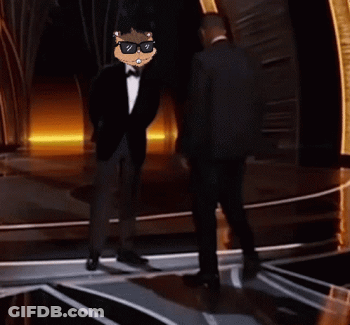 Man In Tuxedo Next To Man In Suit And Tie GIF