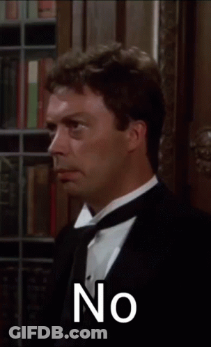 Man In Tuxedo Next To Two Men In Bow Ties GIF