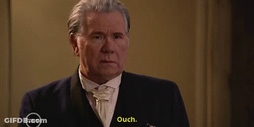 Man In Tuxedo Ouch TNT Ad GIF