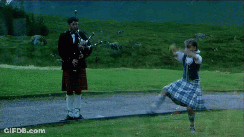 Man In Tuxedo Playing Bagpipe GIF