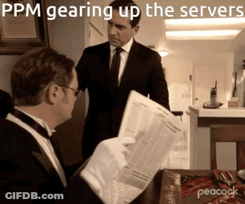 Man In Tuxedo Reading Newspaper With PPM Gearing Up The Servers GIF