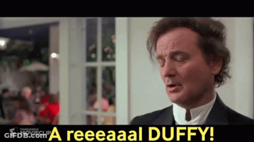 Man In Tuxedo Saying A Reeeaaal Duffy GIF