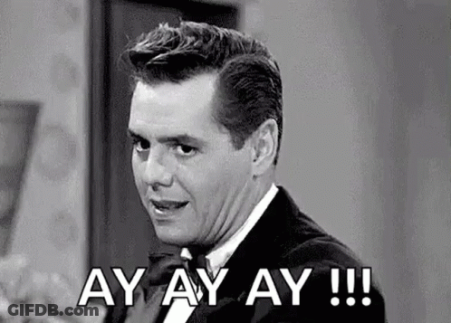 Man In Tuxedo Saying Ay Ay Ay GIF