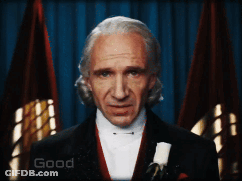 Man In Tuxedo Saying Good GIF