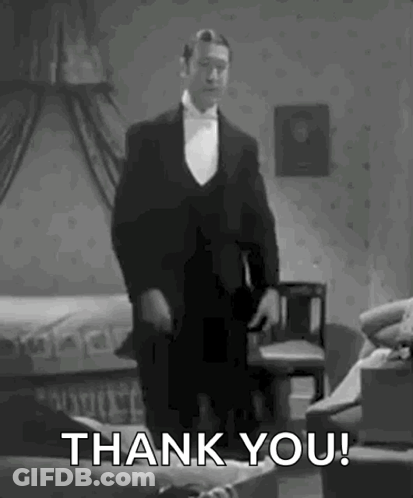 Man In Tuxedo Saying Thank You GIF