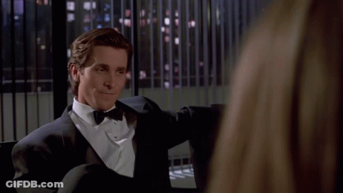Man In Tuxedo Sitting By Window GIF