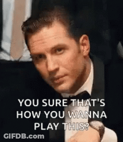 Man In Tuxedo Sitting In Chair GIF