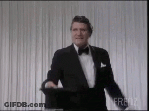 Man In Tuxedo Smiling GIF