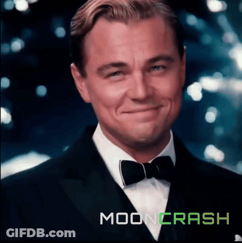 Man In Tuxedo Smiling In Front Of Moon Crash Logo GIF
