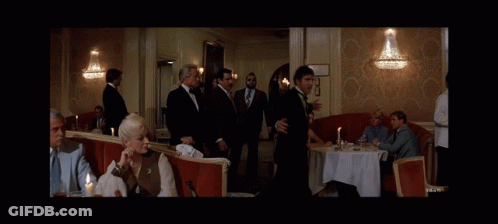 Man In Tuxedo Standing GIF