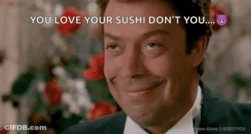 Man In Tuxedo Standing In Front Of People With Clue GIF