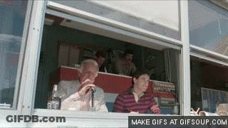 Man In Tuxedo Talking Into Microphone At World Heavyweight Wrestling Mania GIF