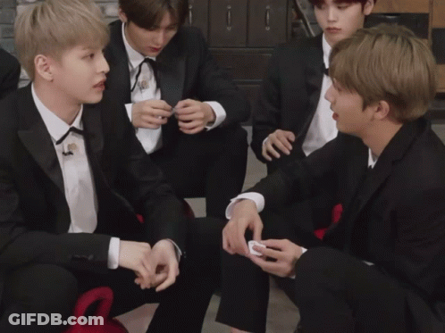 Man In Tuxedo Talking To Suit GIF