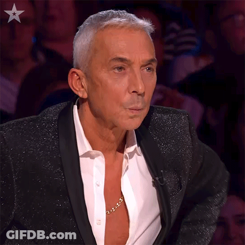 Man In Tuxedo With Gold Chain GIF