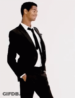 Man In Tuxedo With Hands In Pockets GIF